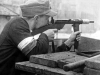 thumbs a youthful upriser defends a barricade with his blyskawica Polish Błyskawica SMG