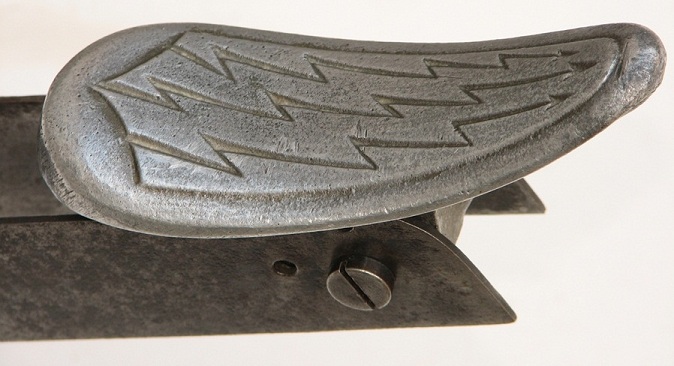 Buttplate with lightning bolts