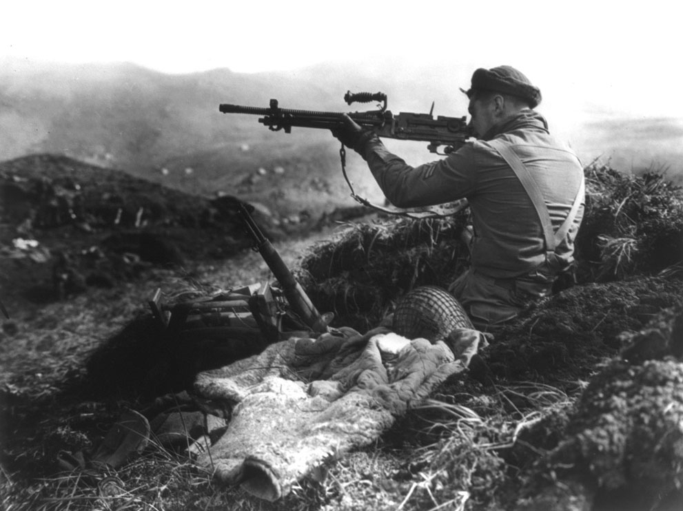 Canadian soldier inspecting a Japanese Type 96 on Kiska, 1944