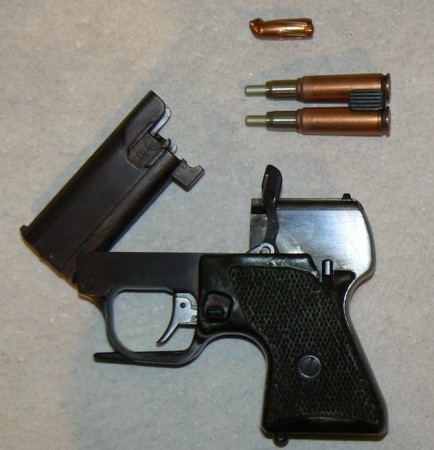 MSP pistol, opened after firing. Note the clip with two fired SP-3 shells and recovered 7.62mm M43 bullet