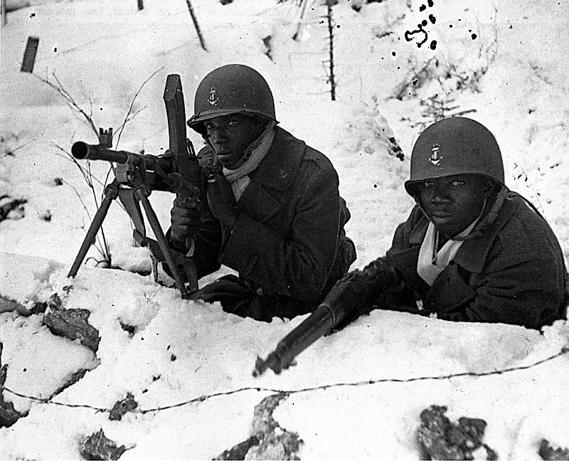 Senegalese Free French soldiers at the Battle of the Bulge in 1944, armed with a British Bren and an American 1903 Springfield.