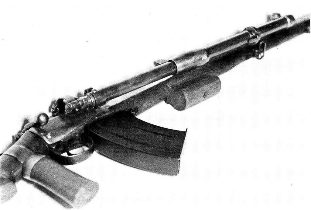 A .303 rifle fitted with the Rieder Automatic Rifle Attachment, extra handles and a larger magazine