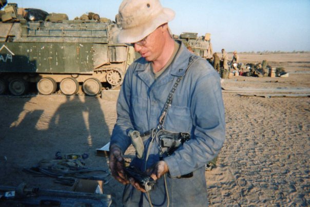 Nick Crawford inspecting arms in Iraq