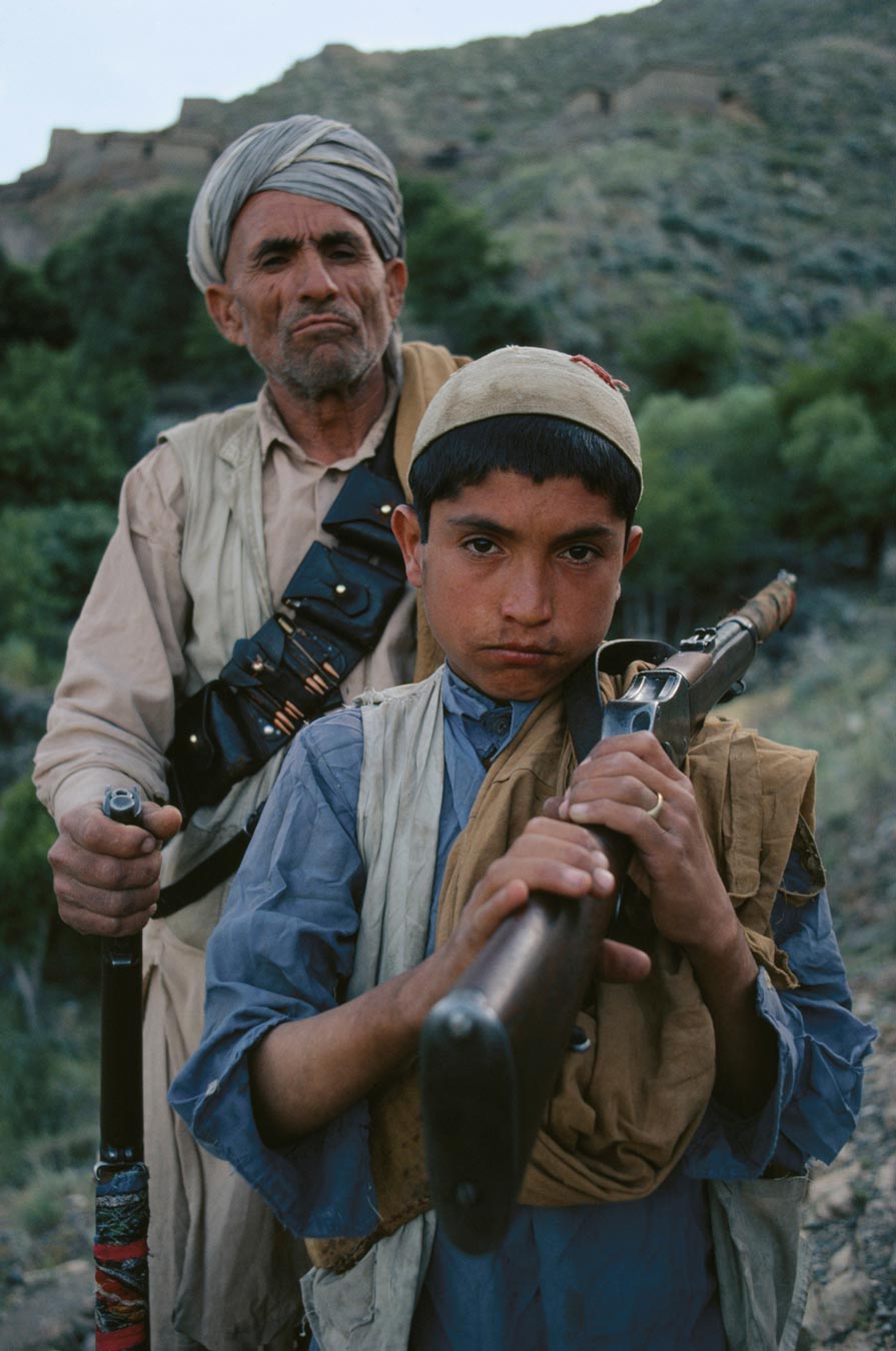 Father (grandfather?) and son in Afghanistan with a Martini and an SMLE.