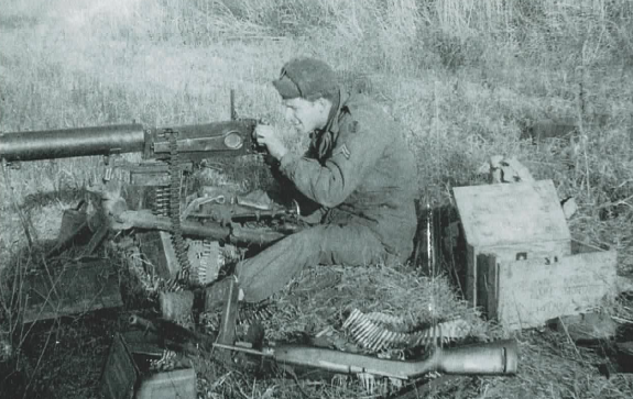 Robert Faris with a Chinese Type 24 Maxim in Korea