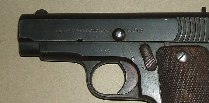 Holster safety knob on a military Eibar/Ruby pistol Holster safety knob on a military Eibar/Ruby pistol