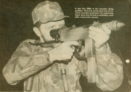 Author firing an Uru SMG