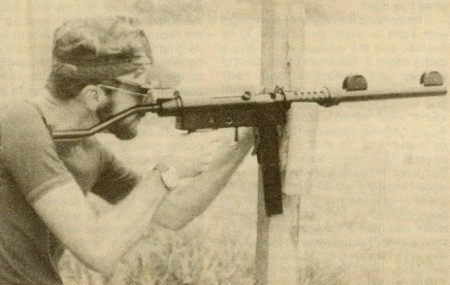 Author firing a suppressed Uru SMG