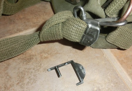 Broken buckle on a M1945 field pack