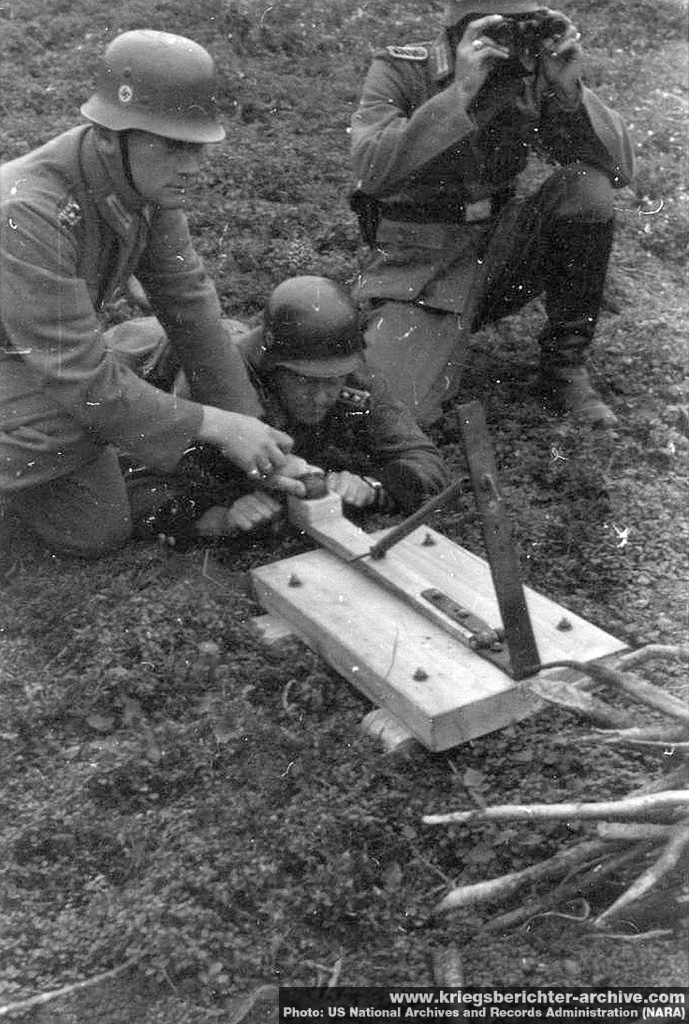 German soldiers experimenting with a grenade catapult
